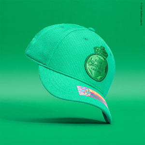 Santos Laguna Club Ink Adjustable hat on a green background.
