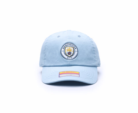 Manchester City Bamo Kids Classic hat with low, unconstructed crown, curved peak, and flip buckle closure, in Light Blue